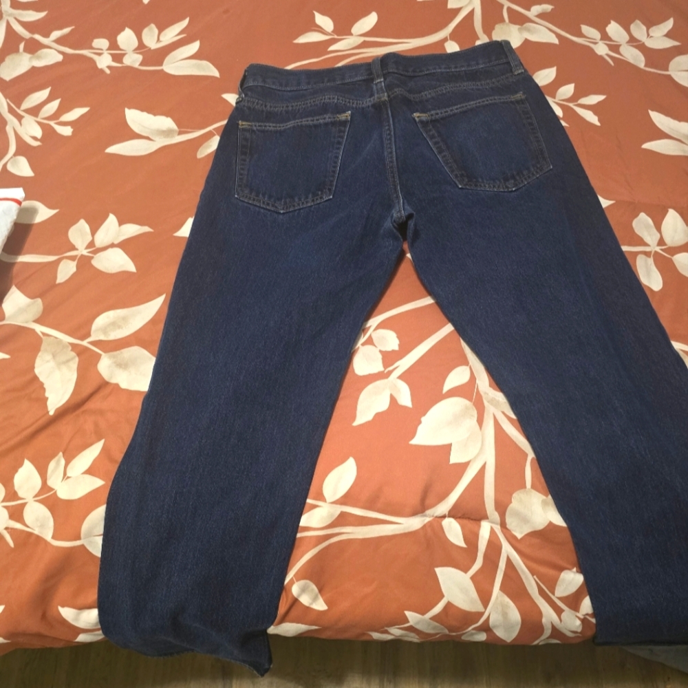Men's jeans, New without tags, never worn, but faded in 1 area due to fold